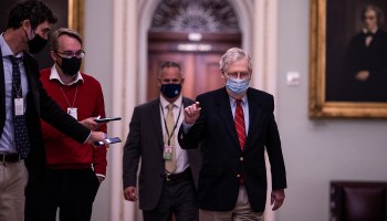 Above, McConnell arrives on Capitol Hill on Dec. 20.