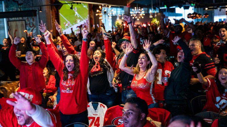 Fans react while watching the Super Bowl on Feb. 2, 2020.