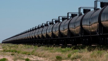 Rail cars carrying crude oil near Odessa, Texas. Sluggish markets are driving companies to find partners.
