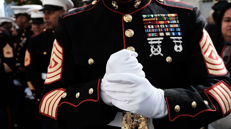 A closeup of a U.S. Marines' uniform as they prepare to march in a Veterans Day Parade in 2017 in New York City.
