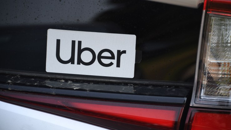 An Uber sticker on a car during a protest by ride-share drivers in 2020. How ride-share and other gig workers are classified remains controversial.