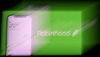 This photo illustration shows the logo of trading application Robinhood on a mobile phone in Arlington, Virginia on January 28, 2021.