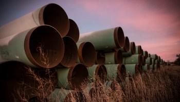 Miles of unused pipe, prepared for the Keystone XL pipeline, sit in a lot on October 14, 2014 outside Gascoyne, North Dakota.