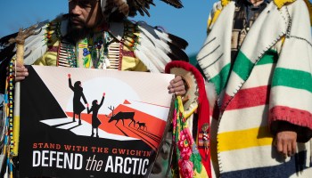 Native American leaders hold signs against drilling in the Arctic National Wildlife Refuge outside the U.S. Capitol in 2018.