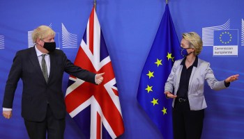 Prime Minister Boris Johnson is welcomed by European Commission President Ursula von der Leyen at the EU headquarters in Brussels on Dec. 9, 2020.
