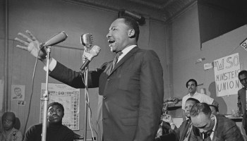 Martin Luther King Jr. addresses a meeting in Chicago in 1966.
