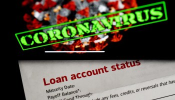 In this photo illustration, a loan statement account status is displayed next a iPhone screen reading "coronavirus."