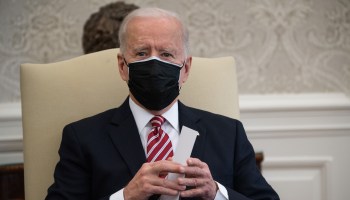 President Joe Biden speaks during a meeting with labor leaders about the American Rescue Plan, the administration's coronavirus response bill, in the Oval Office of the White House in Washington on February 17, 2021.