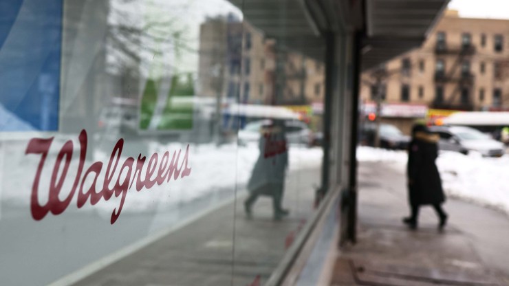 Walgreens signage is seen on a storefront window in the Flatbush neighborhood of Brooklyn on February 9, 2021 in New York City