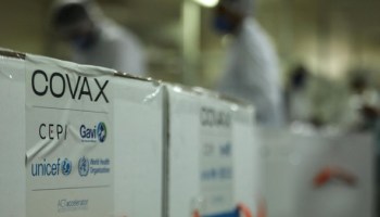 Boxes containing COVID-19 vaccines from COVAX, a global initiative aimed at equitable access to vaccines, arrive in Ghana.