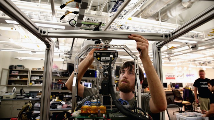 An engineering student works on a robot. Engineering is one of the fields in which the U.S. lags, according to the Bloomberg Innovation Index.