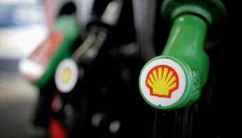 A Shell oil logo on a gasoline pump. Oil and gas companies are grappling with uncertainty as they look to the future.