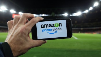 A smartphone displaying Amazon Prime on the screen.