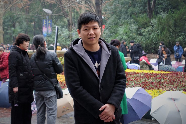 Eric He in Shanghai's marriage market prior to the pandemic lockdown last year. He dreamed of settling in Shanghai one day. (Charles Zhang/Marketplace)