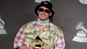 Puerto Rican musician Bad Bunny poses in the press room with the award for "Best Urban Music Album" during the 20th Annual Latin Grammy Awards in Las Vegas, Nevada, on November 14, 2019.
