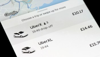 In this photo illustration, a closeup of an Uber app is seen on an iPhone on February 19, 2021 in Cardiff, Wales.