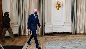 President Joe Biden and Vice President Kamala Harris walk into the State Dining Room to make a statement following the passage of the American Rescue Plan in the U.S. Senate at the White House on March 6, 2021 in Washington.