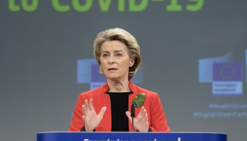 European Commission President Ursula von der Leyen stands at a lectern and speaks during a joint press conference on COVID-19 vaccination in Brussels, Belgium on March 17, 2021.