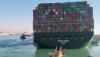 A view of the container ship Ever Given as it begins to move from its stuck position in the Suez Canal.