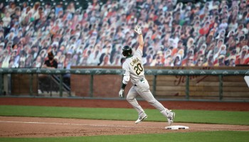 Mark Canha of the Oakland Athletics rounds the bases after he hit a three-run home run on the ninth inning against the San Francisco Giants at Oracle Park on August 15, 2020 in San Francisco, California.