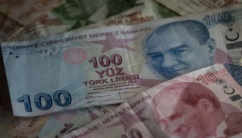Bills of Turkey's lira currency are seen on November 21, 2017 in Istanbul.