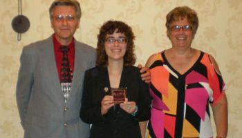 Axton Betz-Hamilton and her parents in 2012.