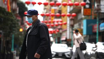 Pedestrians walk through San Francisco's Chinatown.