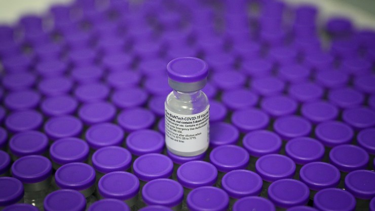 Purple-capped vials of the COVID-19 vaccine.