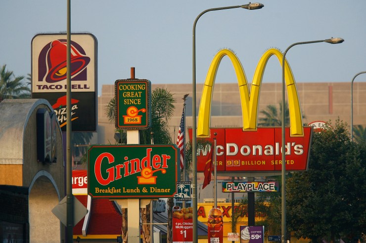 Fast-food restaurants, including Taco Bell, Pizza Hut and McDonald's, line the streets in South Los Angeles.