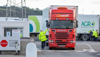 Officials check freight from Scotland as truckers disembark a ferry at the Port of Larne in County Antrim, Northern Ireland on January 1, 2021.