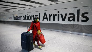 Travelers arrive at Heathrow Airport on January 17, 2021 in London, England.