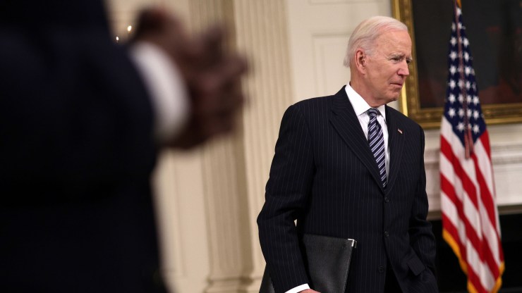 President Joe Biden listens to a question from a member of the press after he delivered remarks on the state of vaccinations at the State Dining Room of the White House on April 6, 2021 in Washington.