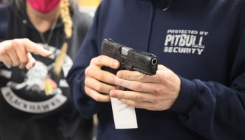 A customer shops for a new handgun at Freddie Bear Sports on April 8, 2021 in Tinley Park, Illinois.