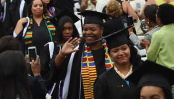 New graduates at Agnes Scott College in Georgia. African Americans need access to capital, Darrick Hamilton says.