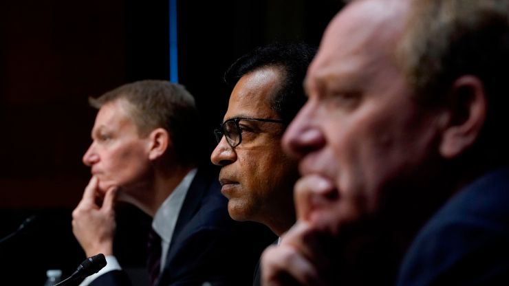 From left, FireEye CEO Kevin Mandia, SolarWinds CEO Sudhakar Ramakrishna and Microsoft President Brad Smith testify on the 2020 cyberattack during a Senate Intelligence Committee hearing on Feb. 23, 2021.