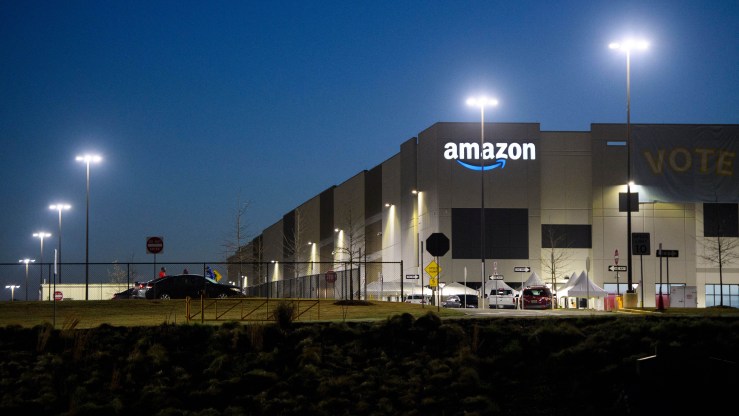 The Amazon.com, Inc. BHM1 fulfillment center is seen before sunrise on March 29, 2021 in Bessemer, Alabama.