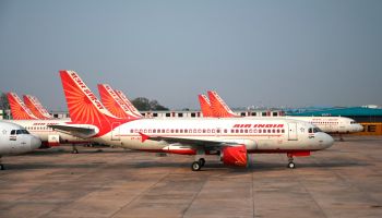 Air India aircraft are seen on a runway at Indira Gandhi International Airport in New Delhi.