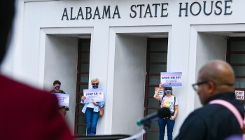 Opponents of several bills targeting transgender youth attend a rally at the Alabama State House to draw attention to anti-transgender legislation introduced in Alabama on March 30, 2021 in Montgomery, Alabama.