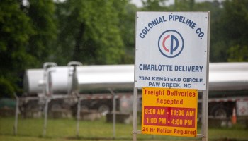 Tanker trucks sit in an adjacent lot next to the entrance of the Colonial Pipeline tank farm in Charlotte, North Carolina.