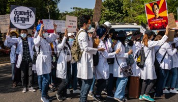 Doctors join a protest against the military coup in front of the Chinese Embassy on February 12, 2021 in Yangon, Myanmar.
