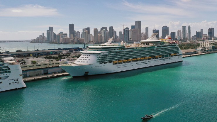 An aerial view from a drone shows Royal Caribbean’s Navigator of the Sea cruise ship docked at PortMiami on March 2, 2021 in Miami, Florida.