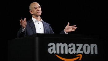 Image of Jeff Bezos behind Amazon podium