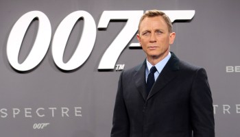 Actor Daniel Craig poses for a photo in front of a "007" logo at the premiere of the James Bond movie "Spectre" in Berlin, Germany.