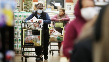 Seniors shop for groceries at Northgate Gonzalez Market in Los Angeles.