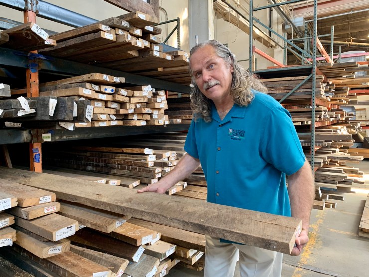 Mark Foster is CEO of Second Chance, a nonprofit selling reclaimed lumber from a massive warehouse in Baltimore. 