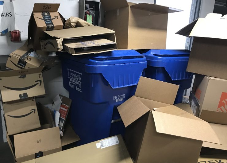 Cardboard overflowing recycling bins. With home delivery a big part of the lockdown experience, Matt Reynolds says consumers are "asking brands to be more aware" of container sustainability.