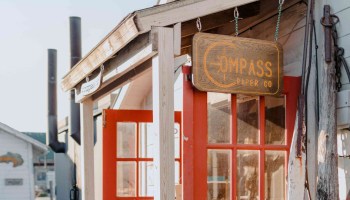 Annie Lang Hartman's Compass Paper Co. shop. She says tourists have already come to the area, even though it's still early in the season.