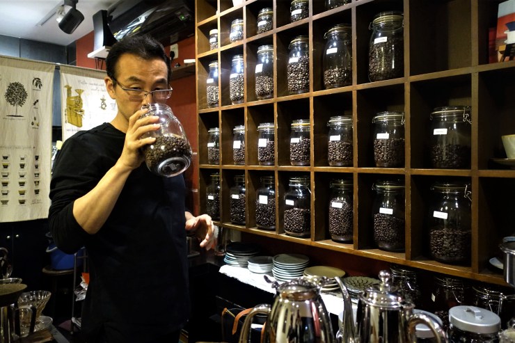 Keiichi Nakayama roasts his own coffee and keeps 40 varieties on hand at Rumors Coffee for customers to choose (Charles Zhang/Marketplace)