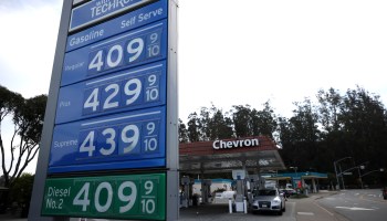 Gas prices, ranging from $4.09 to $4.39 per gallon, are displayed at a Chevron station.