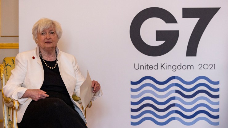 U.S. Treasury Secretary Janet Yellen at Lancaster House on June 5, 2021 in London, England. She sits in front of a sign reading "G-7 United Kingdom 2021."